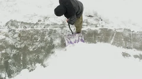Shoveling snow 2 Stock Footage 21235479