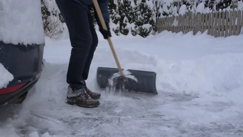 Shoveling snow close up. 스톡 동영상 227245717