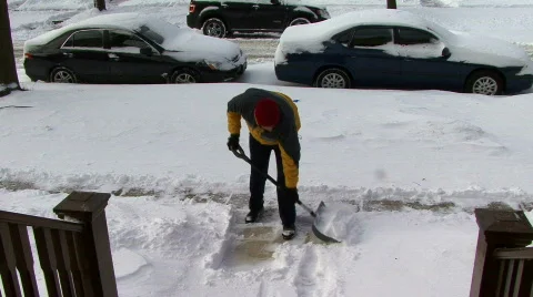 Shoveling Snow 스톡 동영상 620245