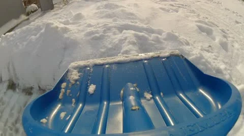 Shoveling snow Stock Footage 19021516