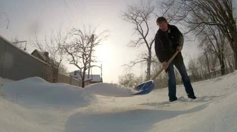 Shoveling snow Stock Footage 19021964