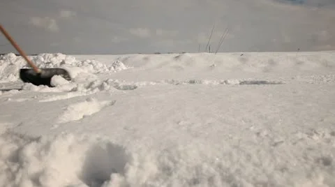 Shoveling snow Stock Footage 22010039