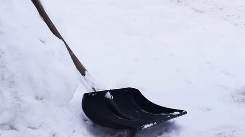 Shoveling Snow Stock Footage 85077650