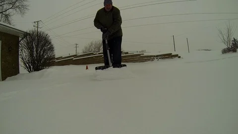 Shoveling Snow - Ground Level View Video stock 85639840