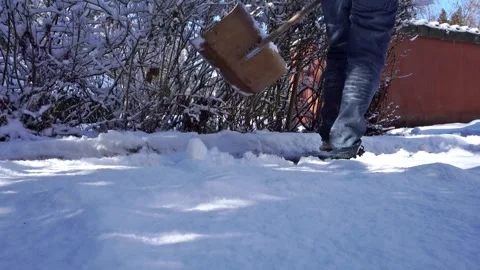 Shoveling Snow - Ground View Stock Footage 277096718