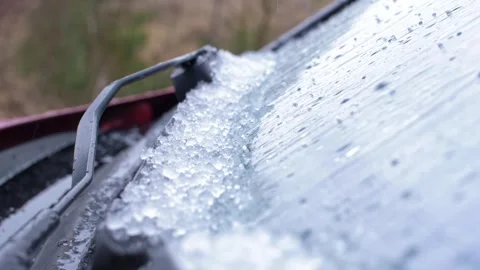 Shover of hail on car windshield Stock Footage 265439254