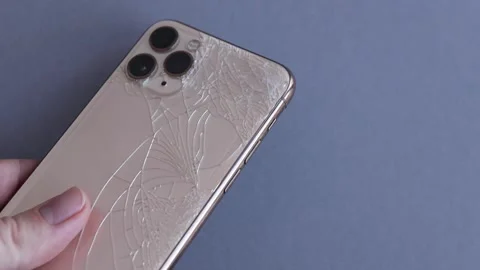 Show Crack on the back of the iPhone phone. Stock Footage 221147852