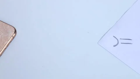 Show Crack on the back of the iPhone phone and a sad emoticon. show cracks . Stock Footage 221147868