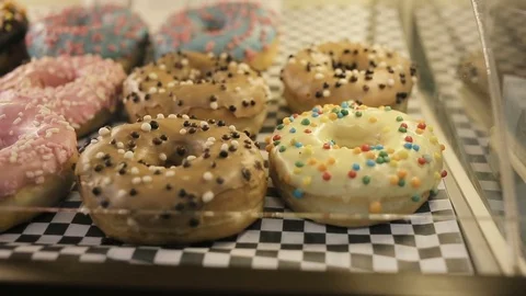 Showcase of cakes, pastry in window display canteen for tasty desert food. Video stock 82742523