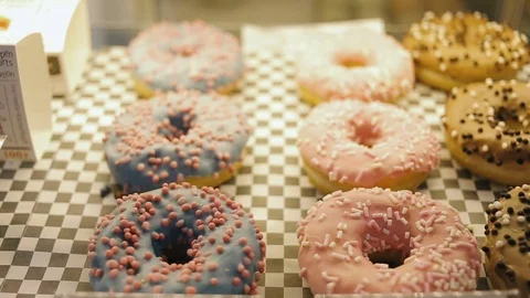 Showcase of cakes, pastry in window display canteen for tasty desert food. Video stock 82742638