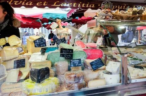 Showcase with cheeses. Stock Photos