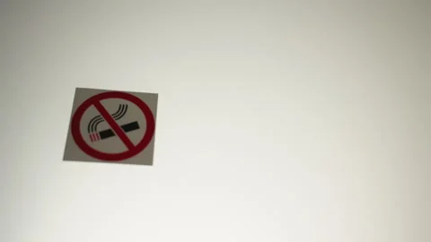 Showcase the commitment to a smoke-free environment with a No Smoking sign 動画素材 272430878