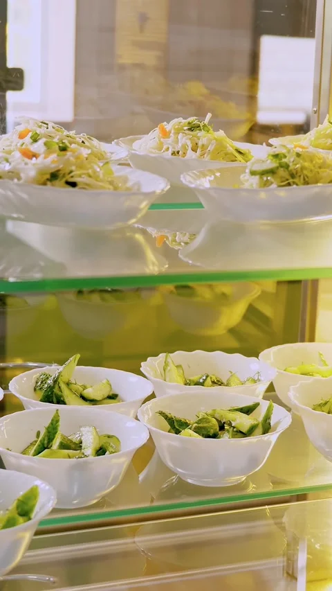 Showcase with different freshly prepared vegetable salads in self-service Stock Footage 320301426