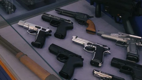 Showcase with guns Stock Footage 86391378