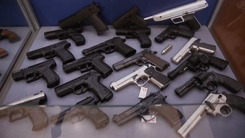 Showcase with guns Stock Footage 86391380