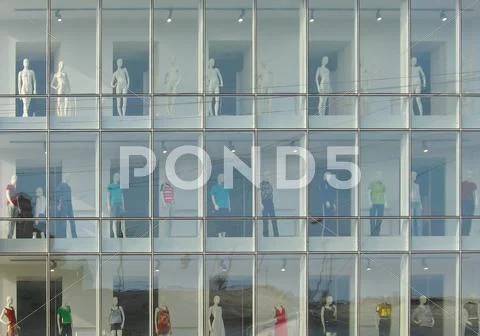 Showcase with the models in the city center. Stock Photos