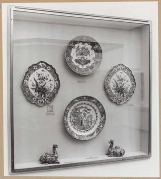 Showcase with objects of ceramics, including two terrines; Vitters crafts.... Stock Photos