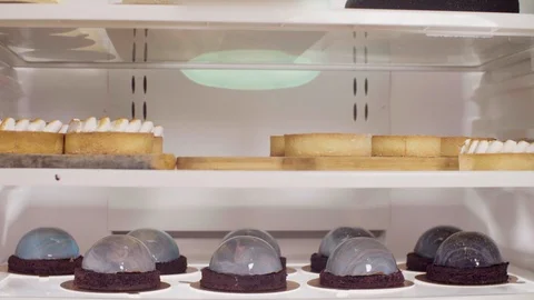 Showcase with ready-made cakes Stock Footage 98042251