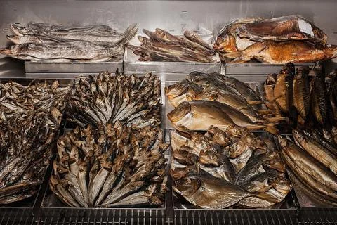 Showcase with smoked fish Stock Photos