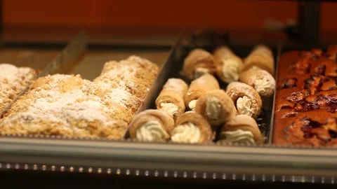Showcase with sweet pastries Stock Footage 105080699