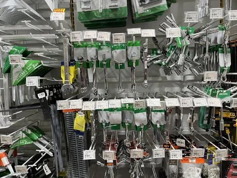 Showcase of tool store. Toolboxes and toolkit in the shop Stock Photos