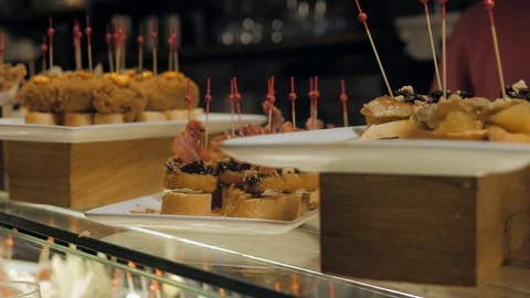 Showcase window display assortiment with tapas – traditional Spanish Stock Footage 113403300