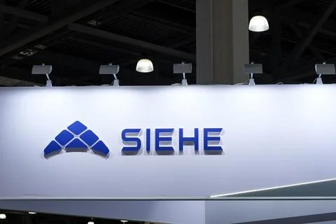 Showcasing Advanced Technology at an Industry Trade Show in a Well-Lit Stock Photos