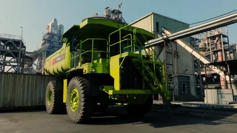 Showcasing EV mining truck technology at a Pakistan factory highlighting heavy Stock Footage 332480190