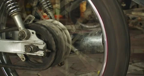 Showcasing her expertise as a top-level auto mechanic. In Hanoi, Vietnam, she Stock Footage 288045217