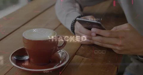 Showcasing red ceramic cup of latte on cafe table, with smartphone hacking Stock Photos