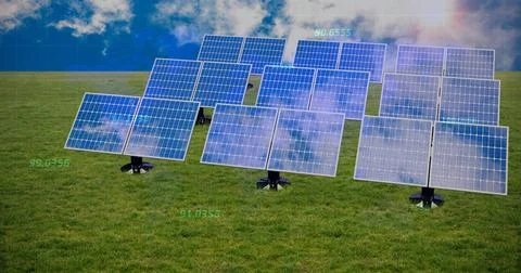 Showcasing solar panel array generating power on green field at rural solar Stock Photos
