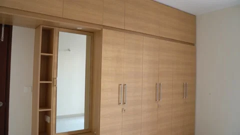 Showcasing wardrobe with mirror for new room Stock Footage 149940737