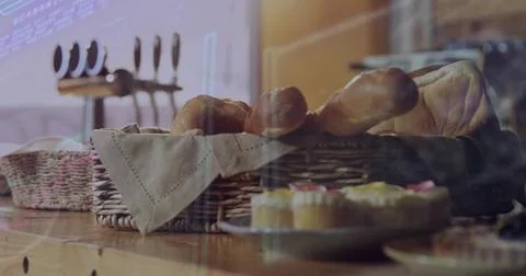 Showcasing wicker basket holding bread loaves and baguettes in bakery, with Stock Photos