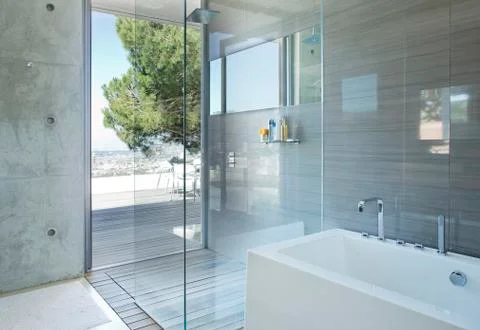 Shower and bath in modern bathroom Stock Photos