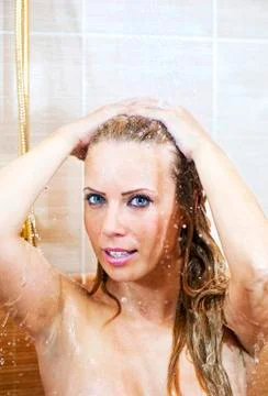 Shower in the bathroom Stock Photos