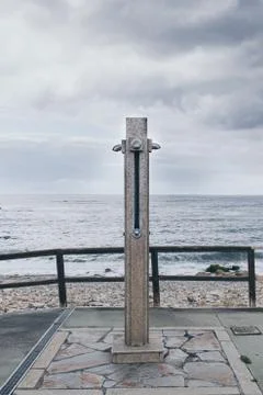 Shower on the beach cloudy day Stock Photos