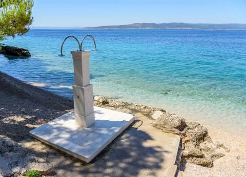Shower on the beach Stock Photos