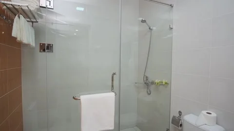 Shower cabin in the room of a small cozy hotel Stock Footage 280450205