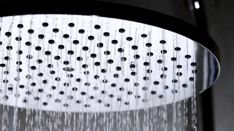 Shower flowing in close-up and slow motion Stock Footage 84409485