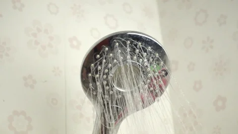 Shower flowing in close-up and slow motion 스톡 동영상 109474525
