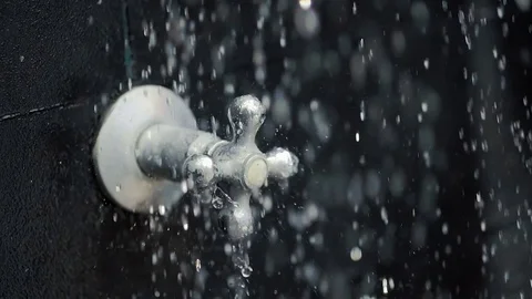Shower handle with water falling in the darkness Stock-Footage 71575017