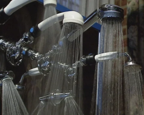 Shower head testing (1990s) Stock Footage 125435946
