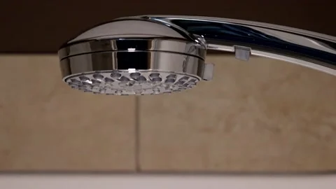 Shower Head Turning On - close up slow motion Stock Footage 131476780