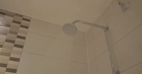 Shower head turning on/off Stock Footage 81948274
