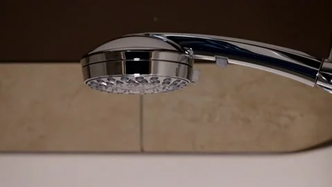 Shower Head Turning On - medium shot slow motion Stock Footage 131476814