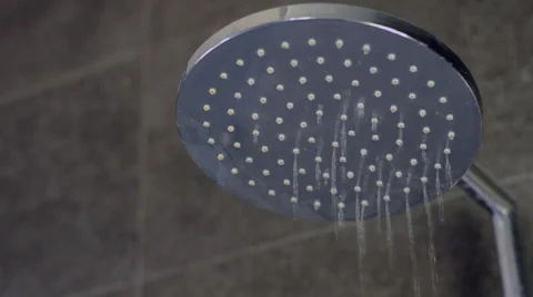 Shower head turning on water dropping Video stock 48659977