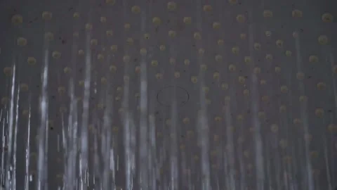 Shower head turning on with water streams, bathroom scene, cleanliness and Stock Footage 342634801
