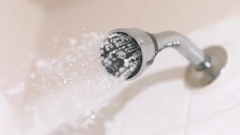 Shower Head Turns On at 1500fps Stock Footage 104850047