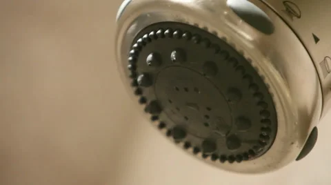 A shower head turns on, then off. Stock-Footage 46579703