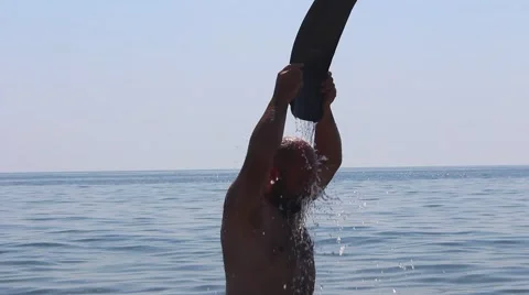 Shower man Taking Sea beach cooling Stock Footage 67989237
